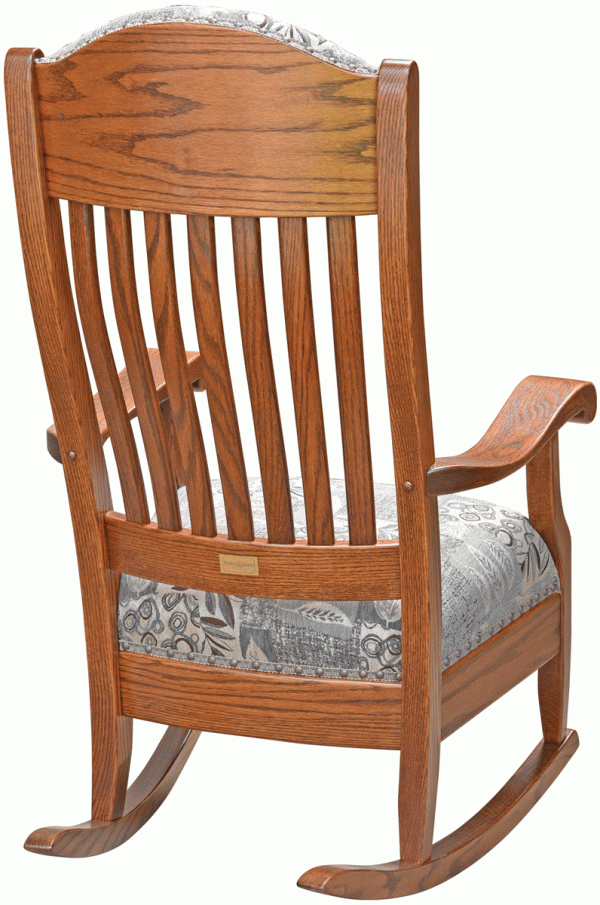 Back of light wooden rocking chair with cushion