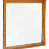 A mirror with a wooden frame