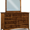 light wooden dresser with a mirror and dark drawers